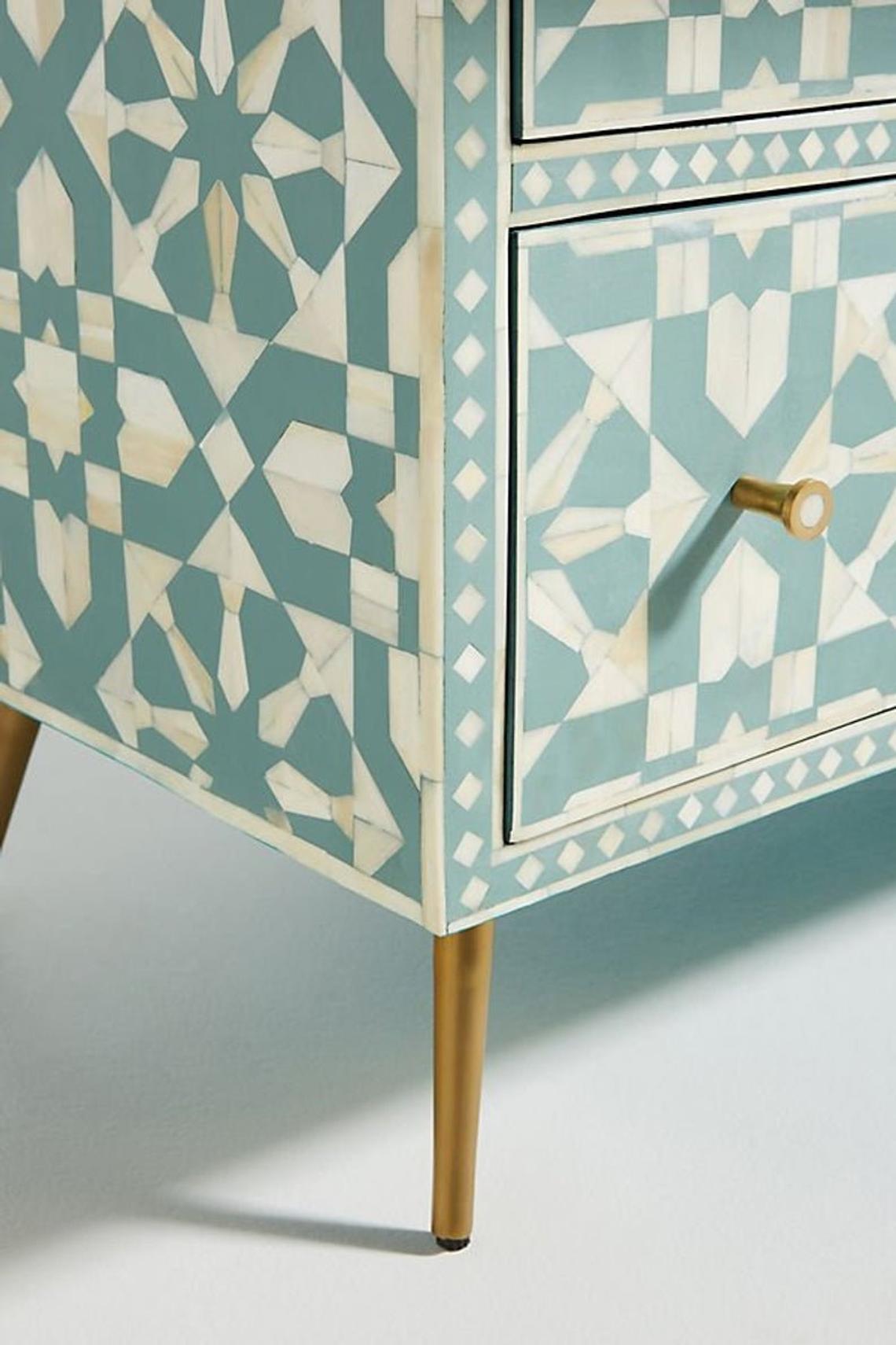 Closeup Shot of Moroccan Green Buffet with Brass Legs